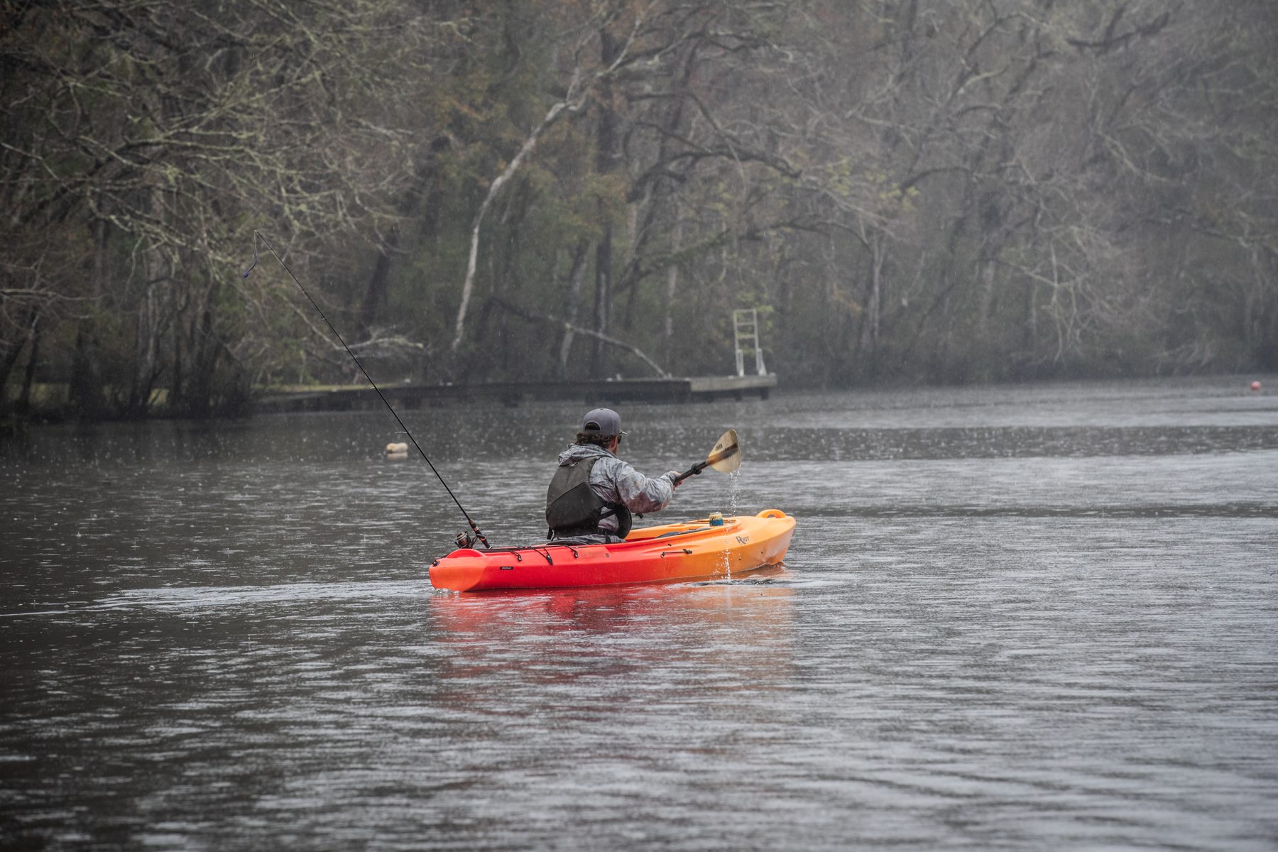 Paddler enjoying the Bayside 10 on a calm lake