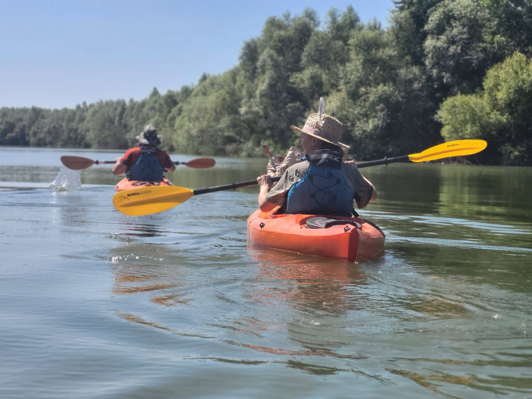 Paddler comfortably seated in the Glide 9.5 cockpit