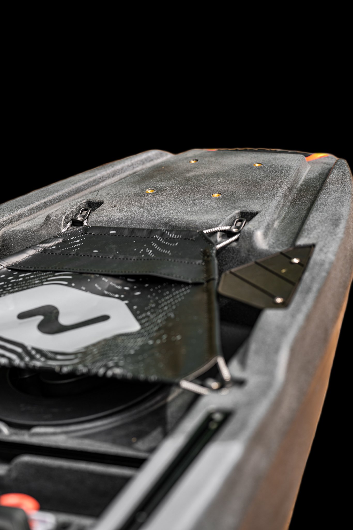 Integrated rod staging channels and rod flap retainers
