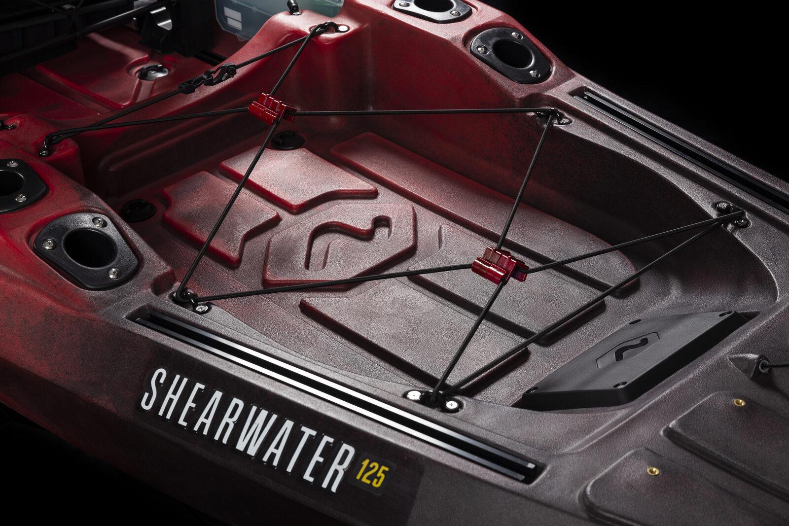 Rear tank well with bungees and cooler clips